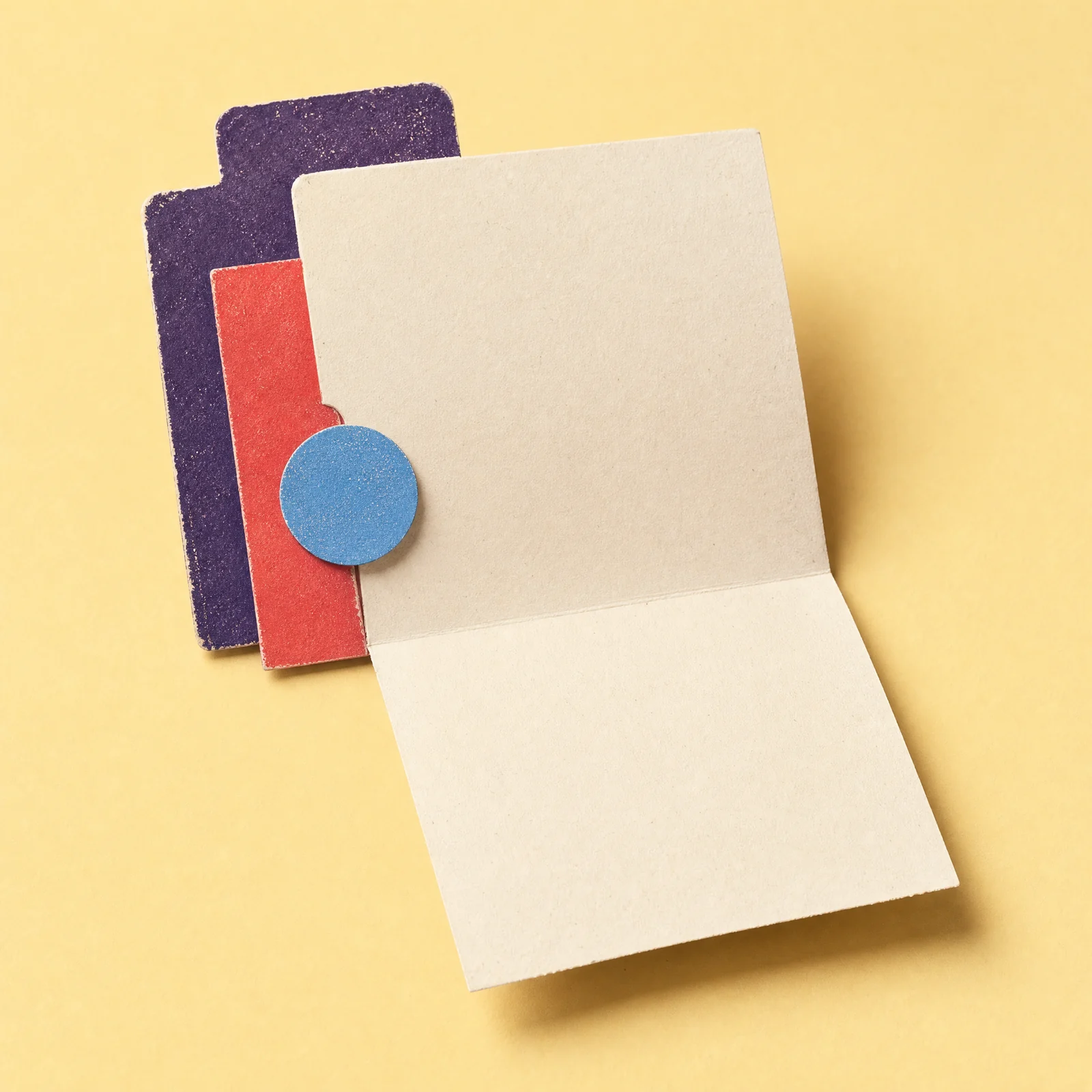 A folded working note with colourful page tabs